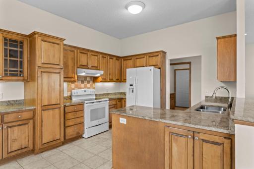 Beautiful natural wood cabinetry! Granite countertops.