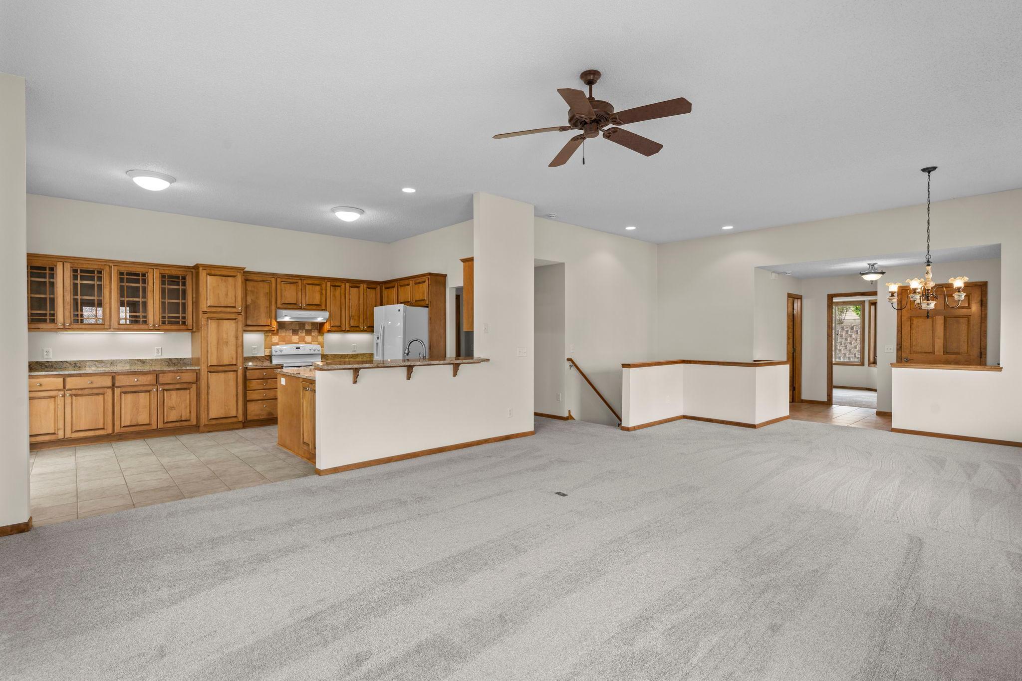 Move in ready with brand new carpeting and fresh paint! You'll love the high ceilings.