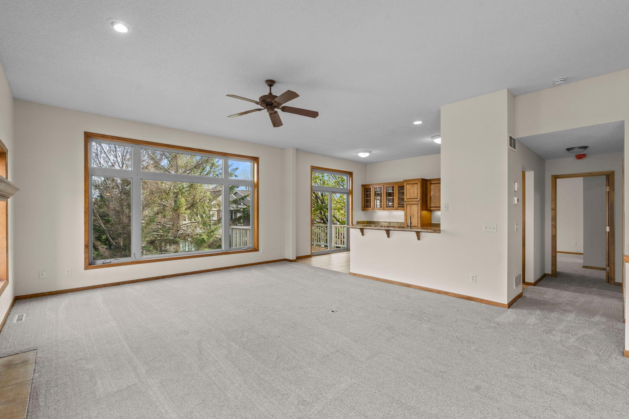 Spacious main level with informal dining, living room, a ton of windows and a cozy, gas fireplace.