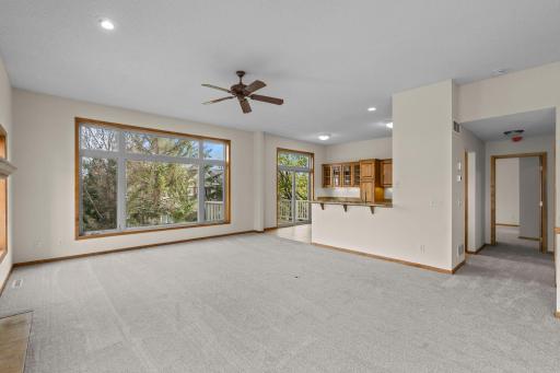 Spacious main level with informal dining, living room, a ton of windows and a cozy, gas fireplace.
