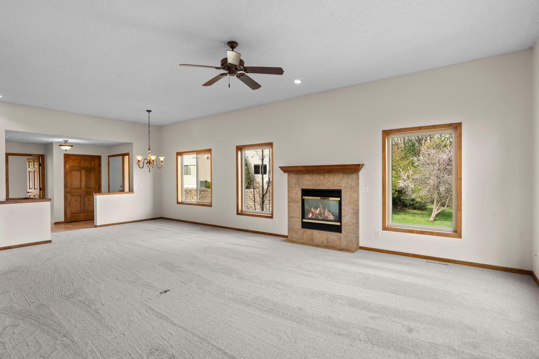 Spacious main level with informal dining, living room, a ton of windows and a cozy, gas fireplace.