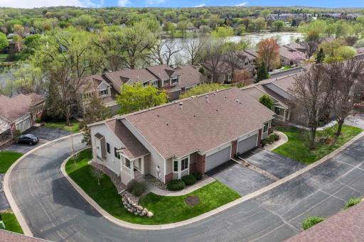Fantastic end-unit, one level living in sought after neighborhood of Summit Shores nestled along Earley Lake.