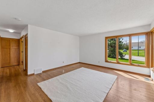 Hardwood floors throughout the main level living room and both bedrooms.