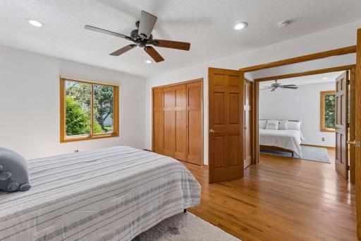 Both bedrooms on the main level are oversized with refinished hardwood floors and solid wood doors.