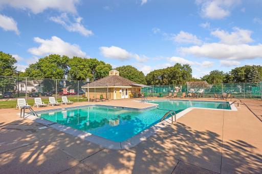 Shared heated in-ground pool, including a pool house with bathrooms.