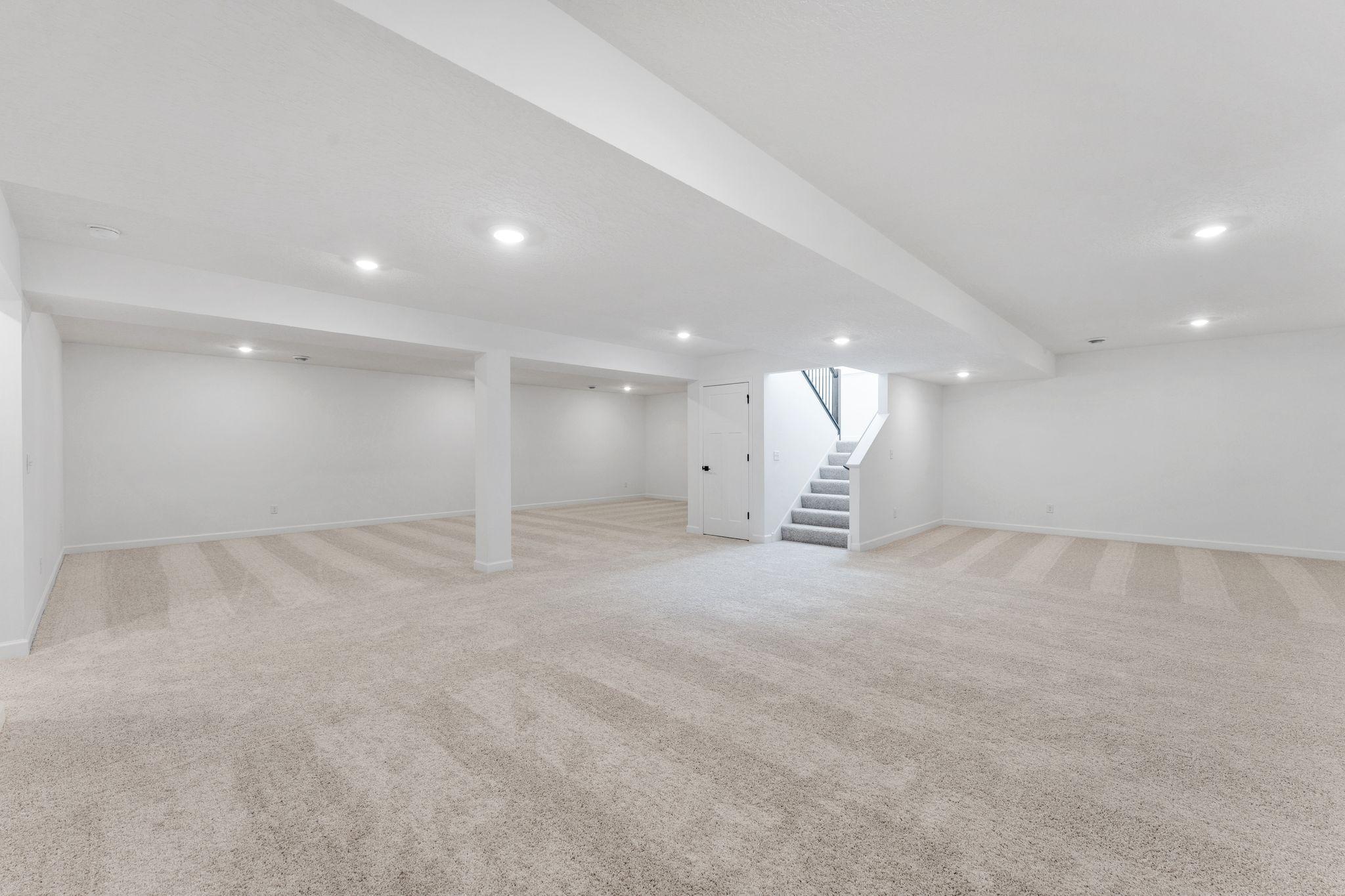 (Photo of a similar home, actual finishes may vary) For homeowners seeking additional living and entertainment space, this home is perfect with it's finished basement. It includes an expansive recreation room, fourth bedroom and third bathroom.