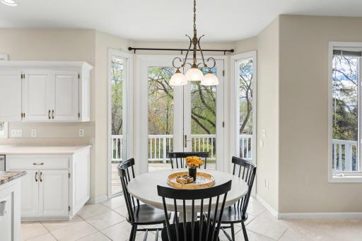 Informal dining area with access to outdoor deck