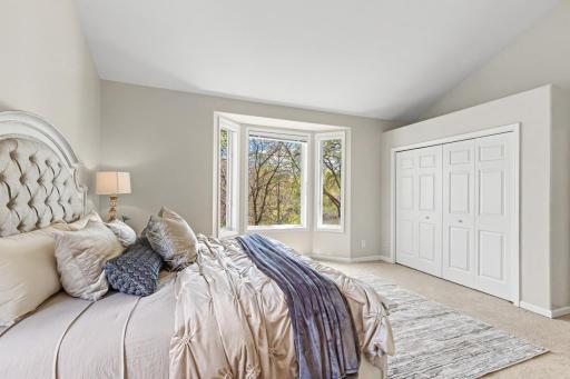 Soaring ceilings and oversized windows creating a bright, peaceful atmosphere