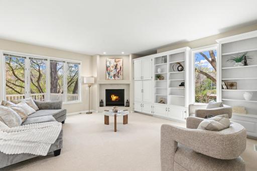 Cozy fireplace and custom built-ins and exceptional storage throughout