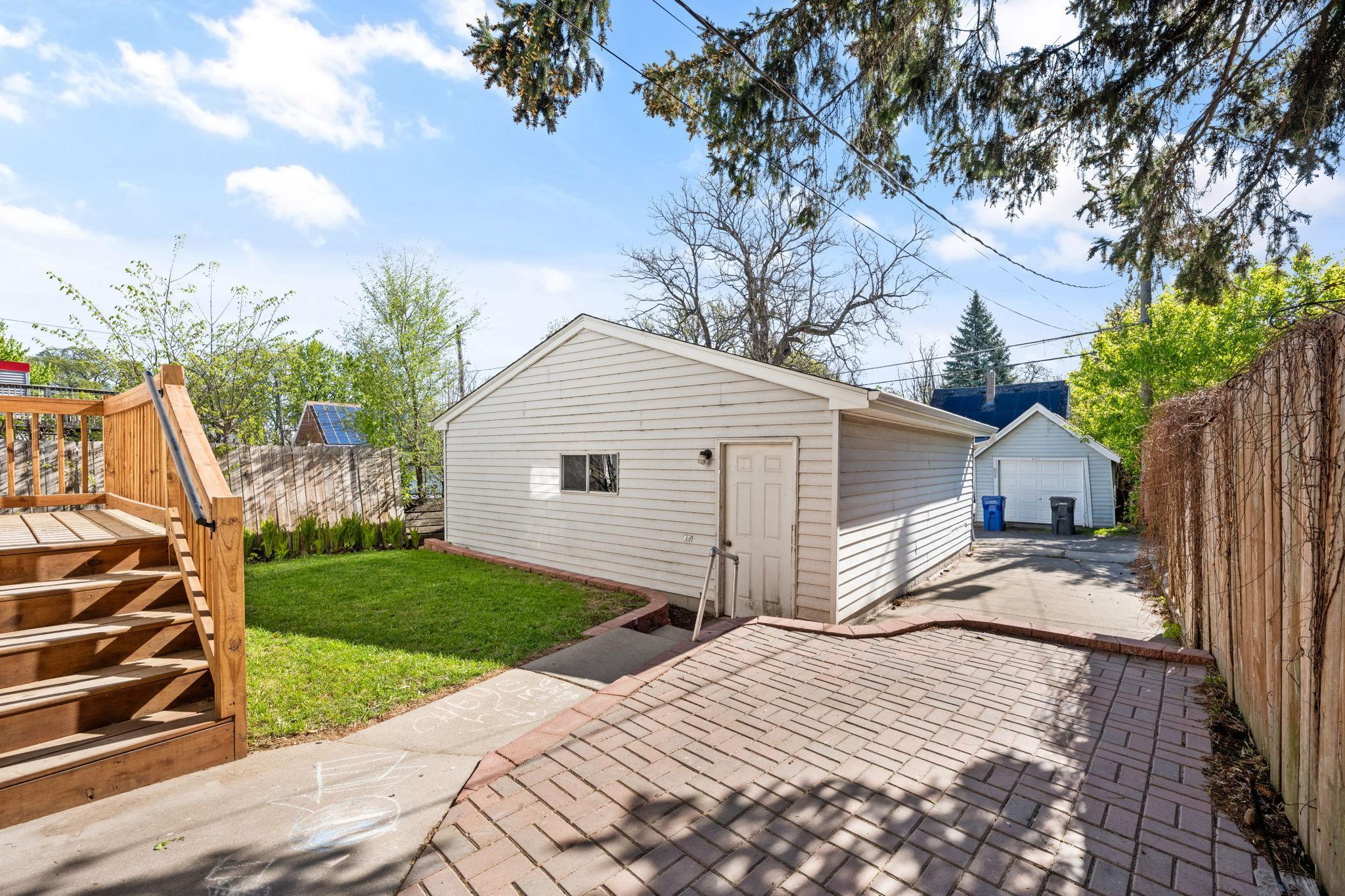 Enjoy summer bbq's in your backyard and brick patio.