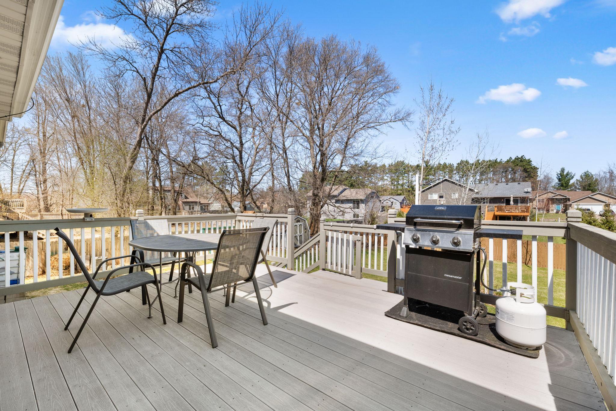 Very spacious deck, overlooking gorgeous backyard!