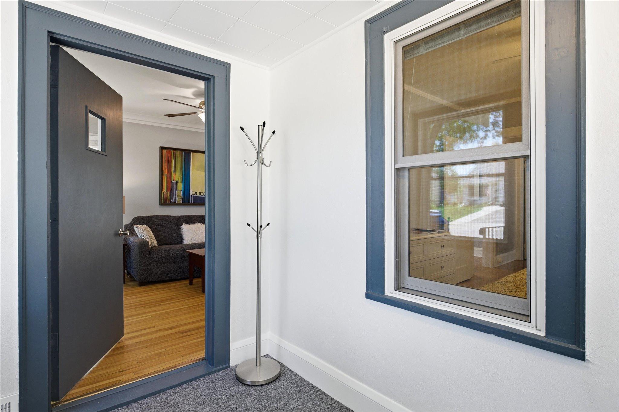 Step inside and you’re greeted by an inviting entrance leading directly into the bright living room.