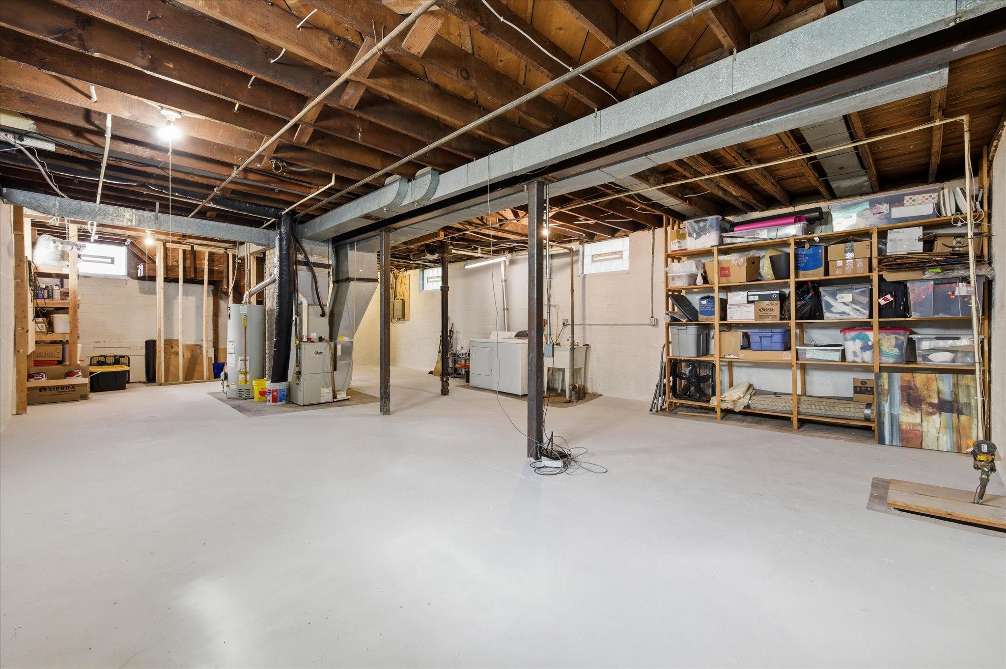 The lower level offers tremendous potential for future expansion. Create a family room, office, gym, or workshop while enjoying the benefit of the home’s unusually high basement ceilings.