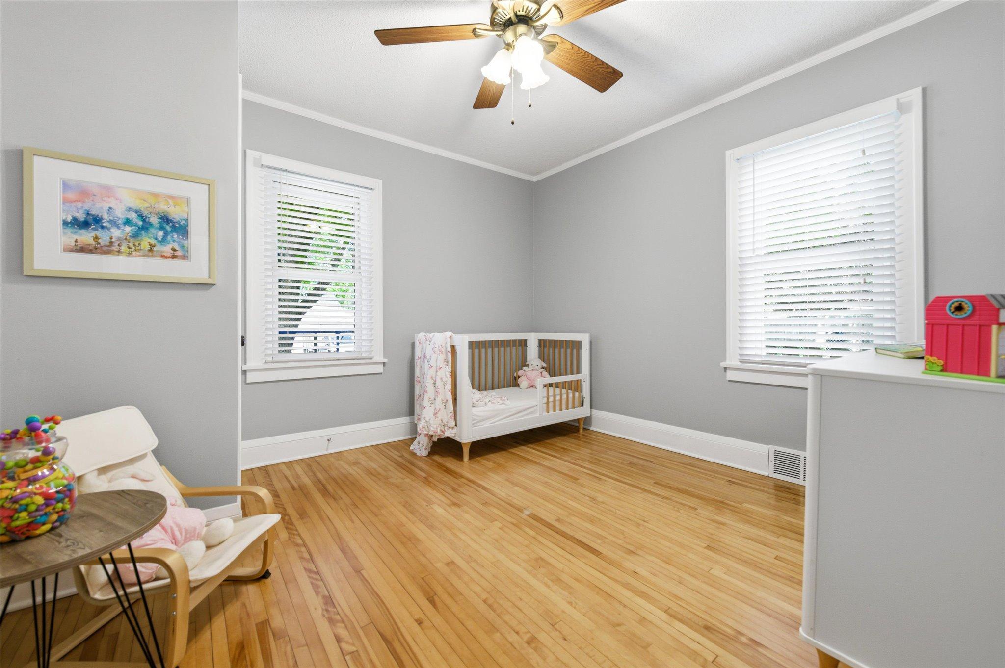 Currently used as a nursery, this versatile bedroom could easily become a guest room, home office, hobby room, or cozy retreat.