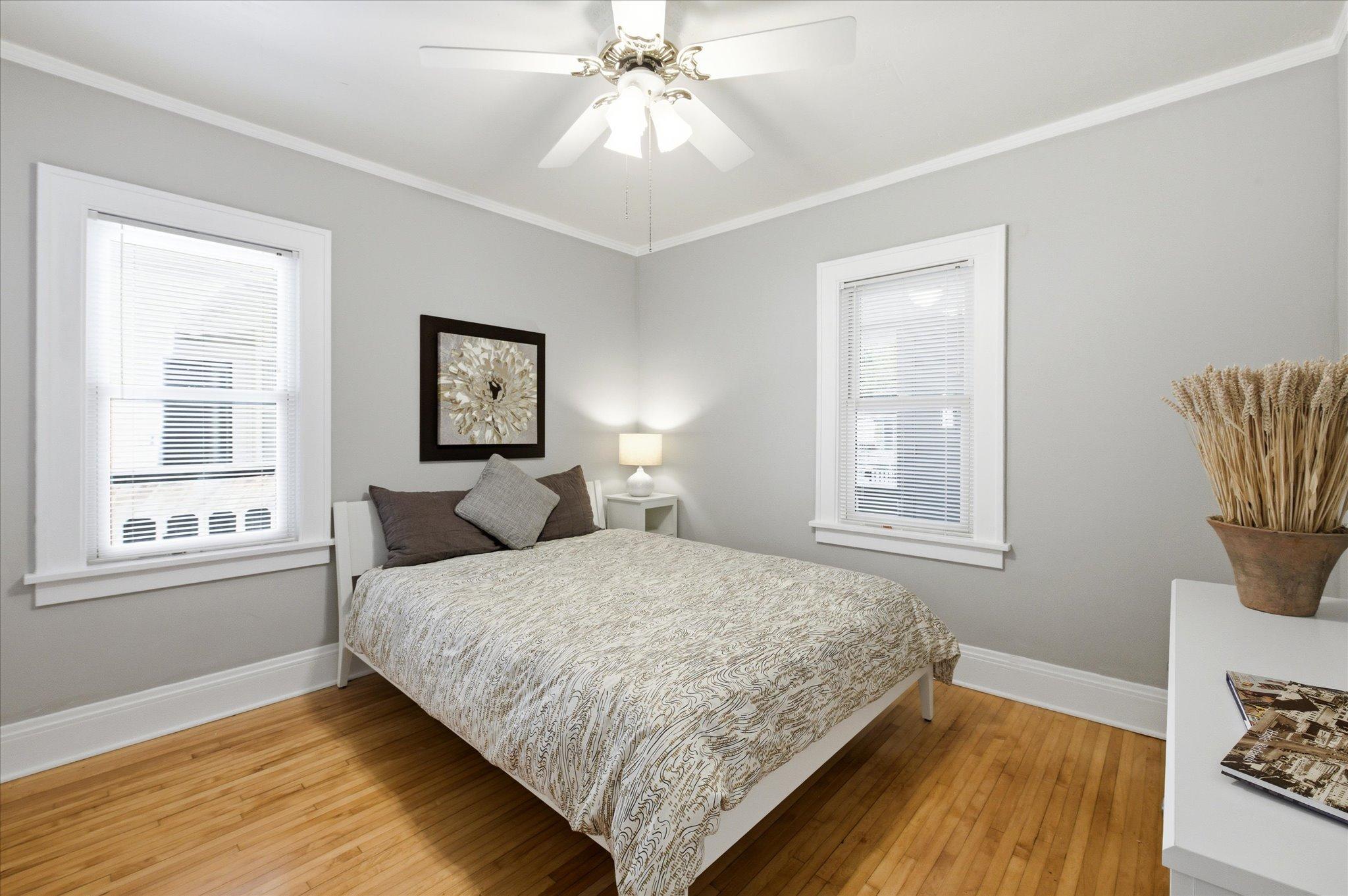 This comfortable main-floor bedroom offers great natural light and a versatile layout ready to fit your needs.