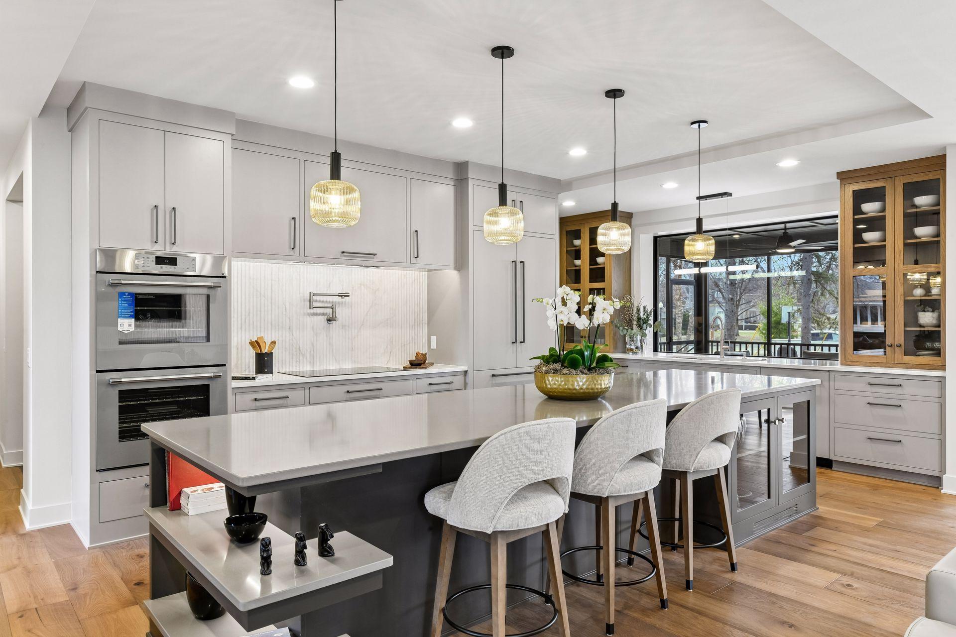 Spacious kitchen, custom cabinetry, professional grade appliances, quartz countertops throughout.