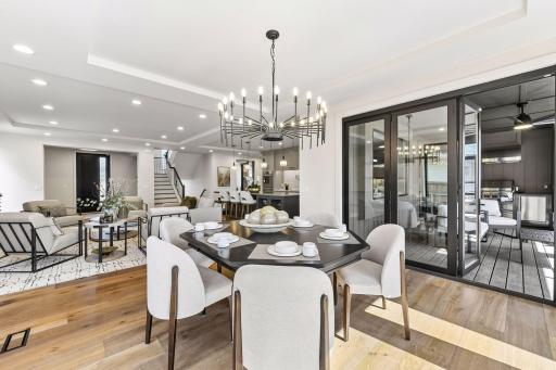 A tri-fold door offers easy access from the dining area to the screened porch.