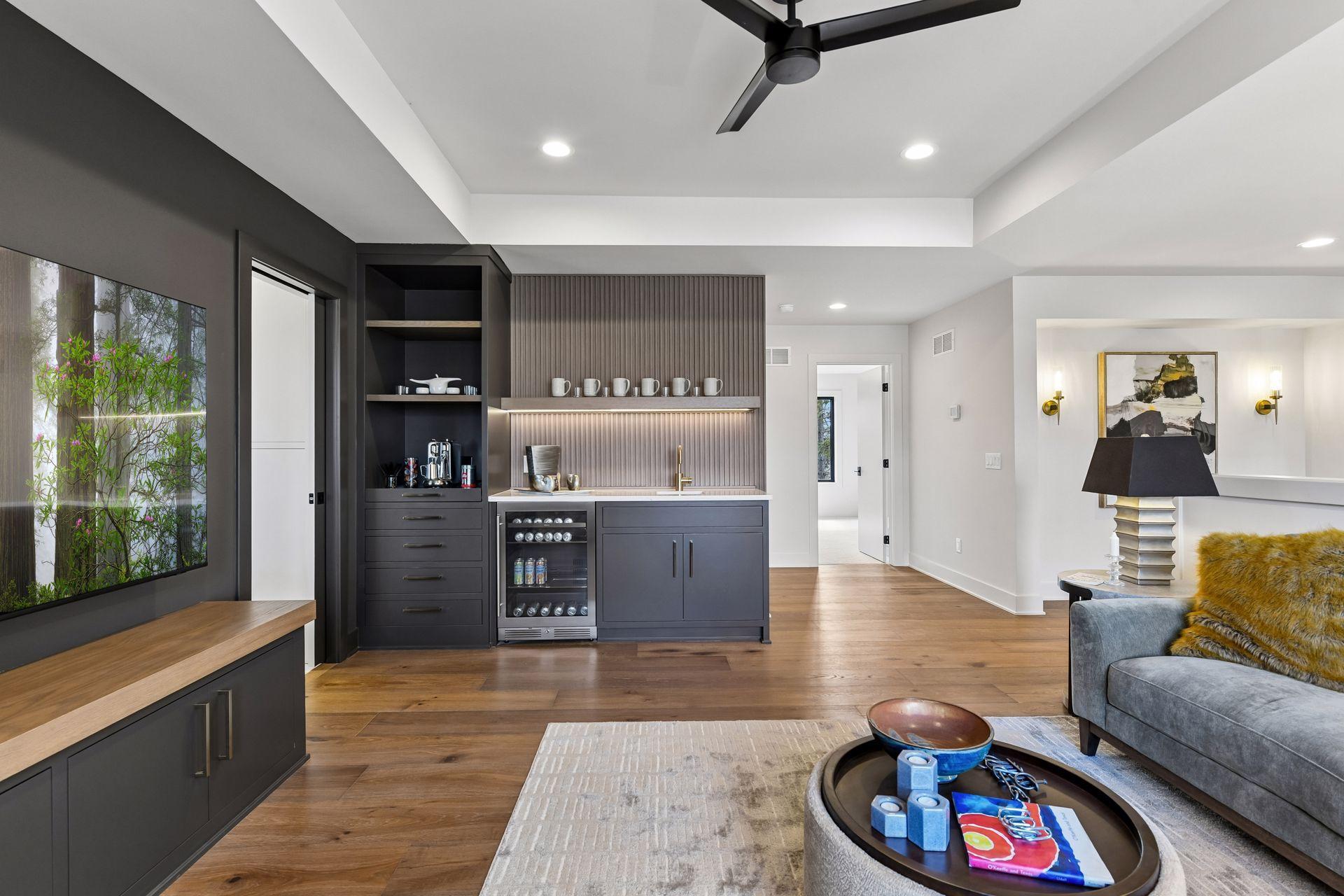 Custom built-in with coffee bar, beverage refrigerator & sink.
