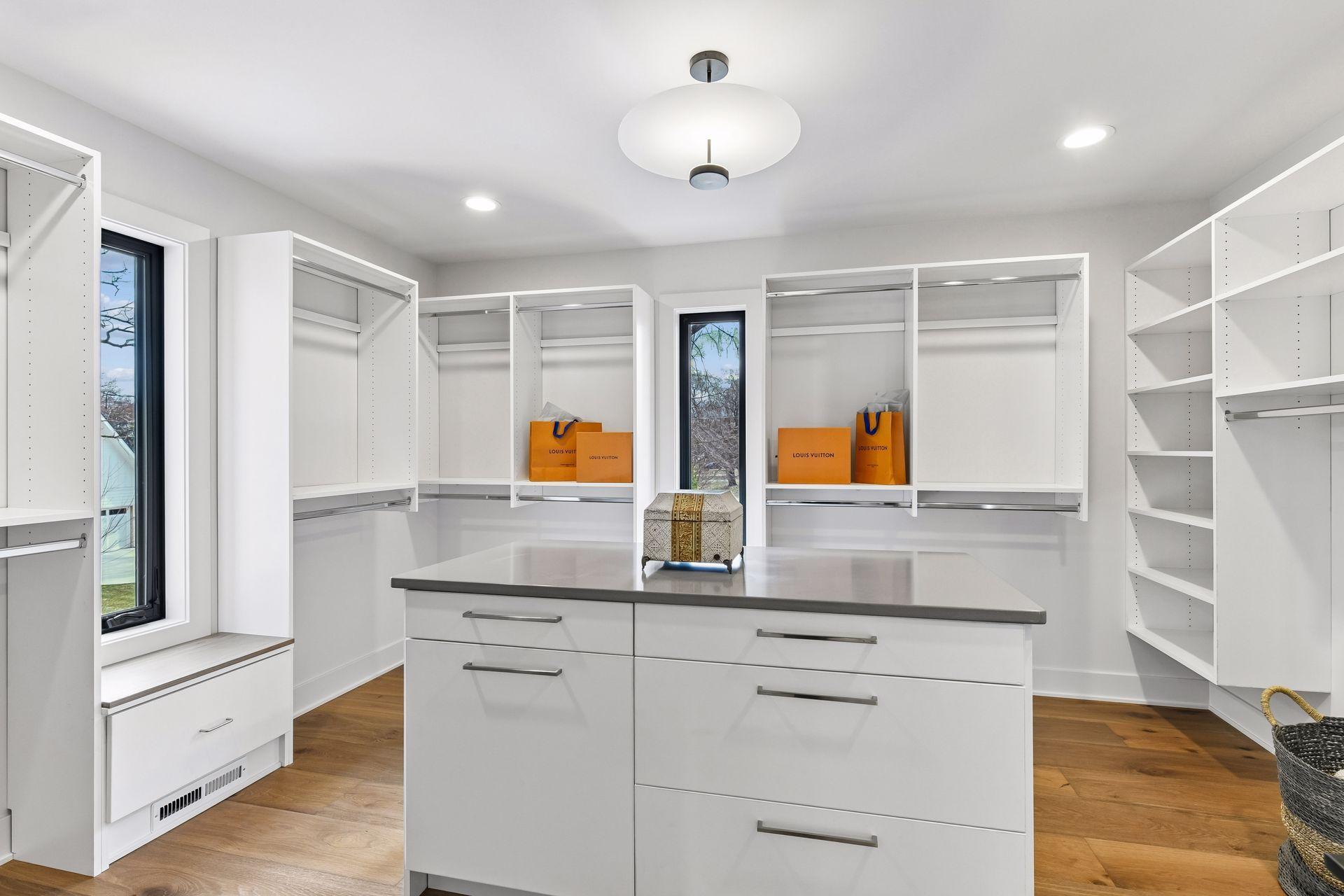 Master walk-in center island closet.