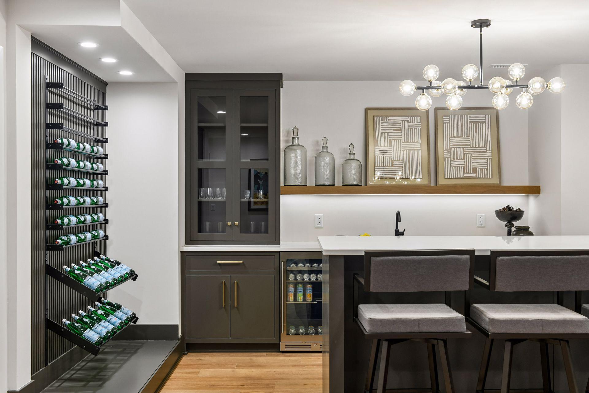 Lower level custom built-ins with wine/beverage refrigerator.