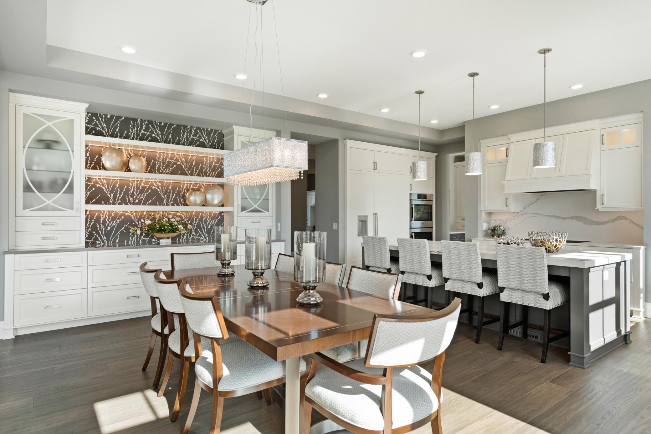 Underlit shelving beautifully showcases your favorite dining pieces and curated décor