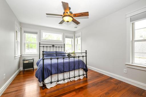 Upstairs owners suite includes multiple windows and plentiful natural lighting
