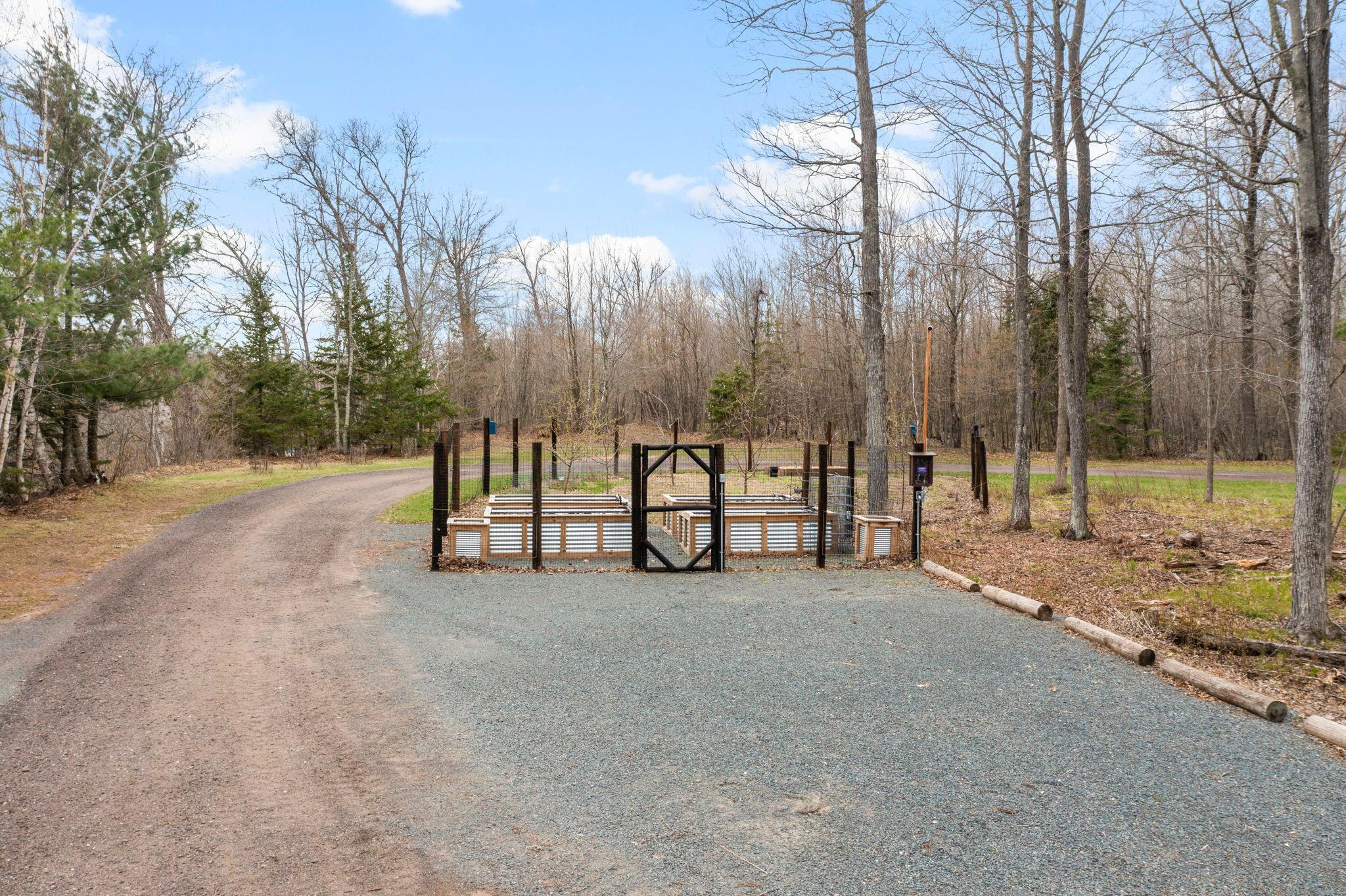Established garden and orchard with electric fence to keep out the critters