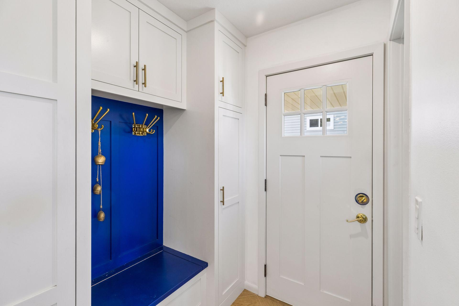Off the side door is a fantastic mudroom area.