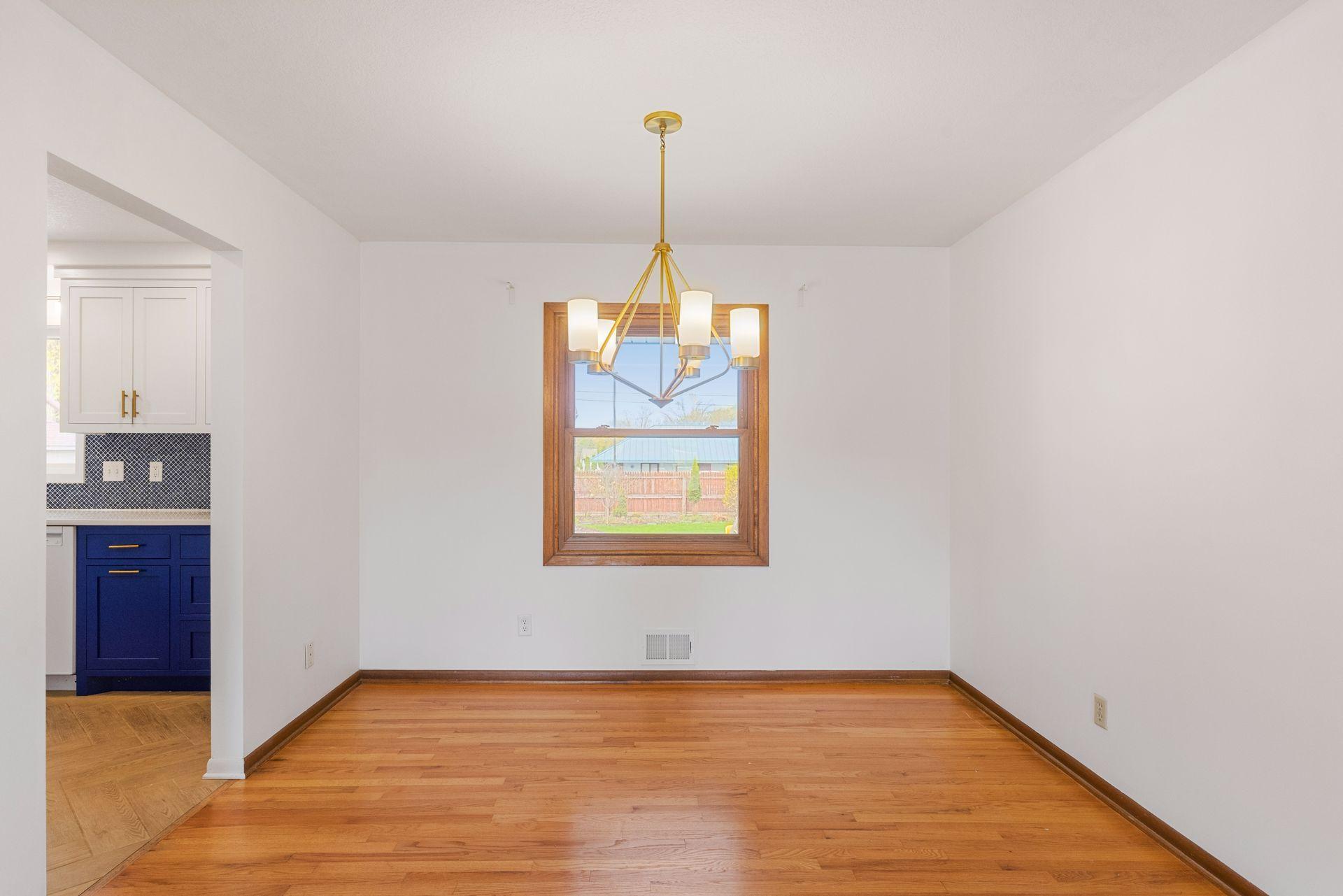 The dining room overlooks the backyard.