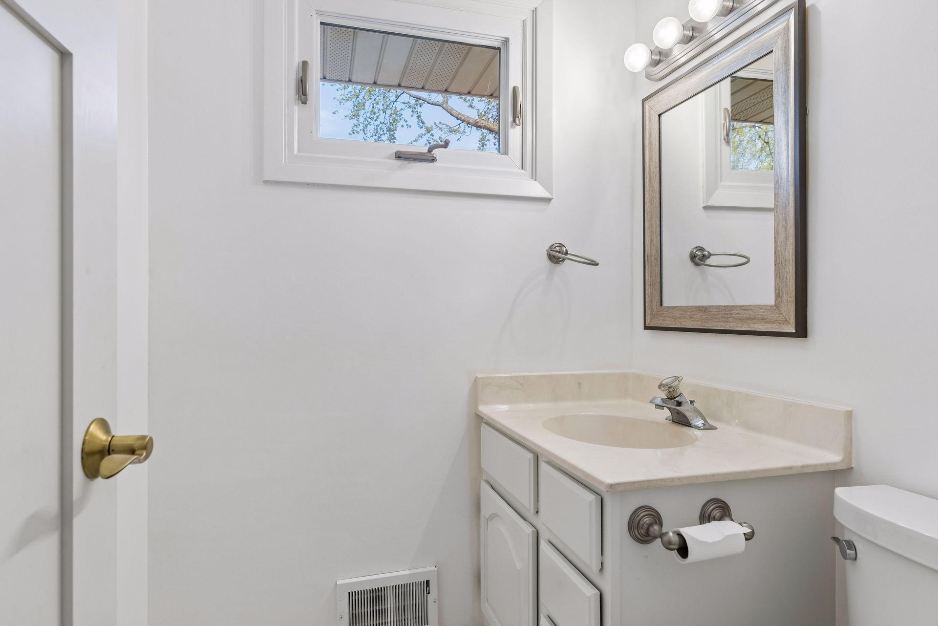 There is also a half bath here; perfect for guests.