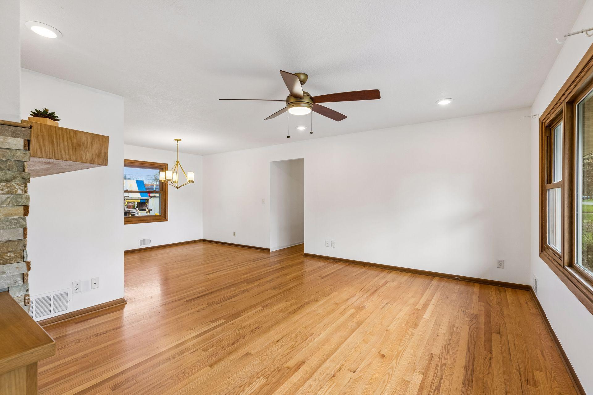 The main floor boasts gleaming hardwood flooring.