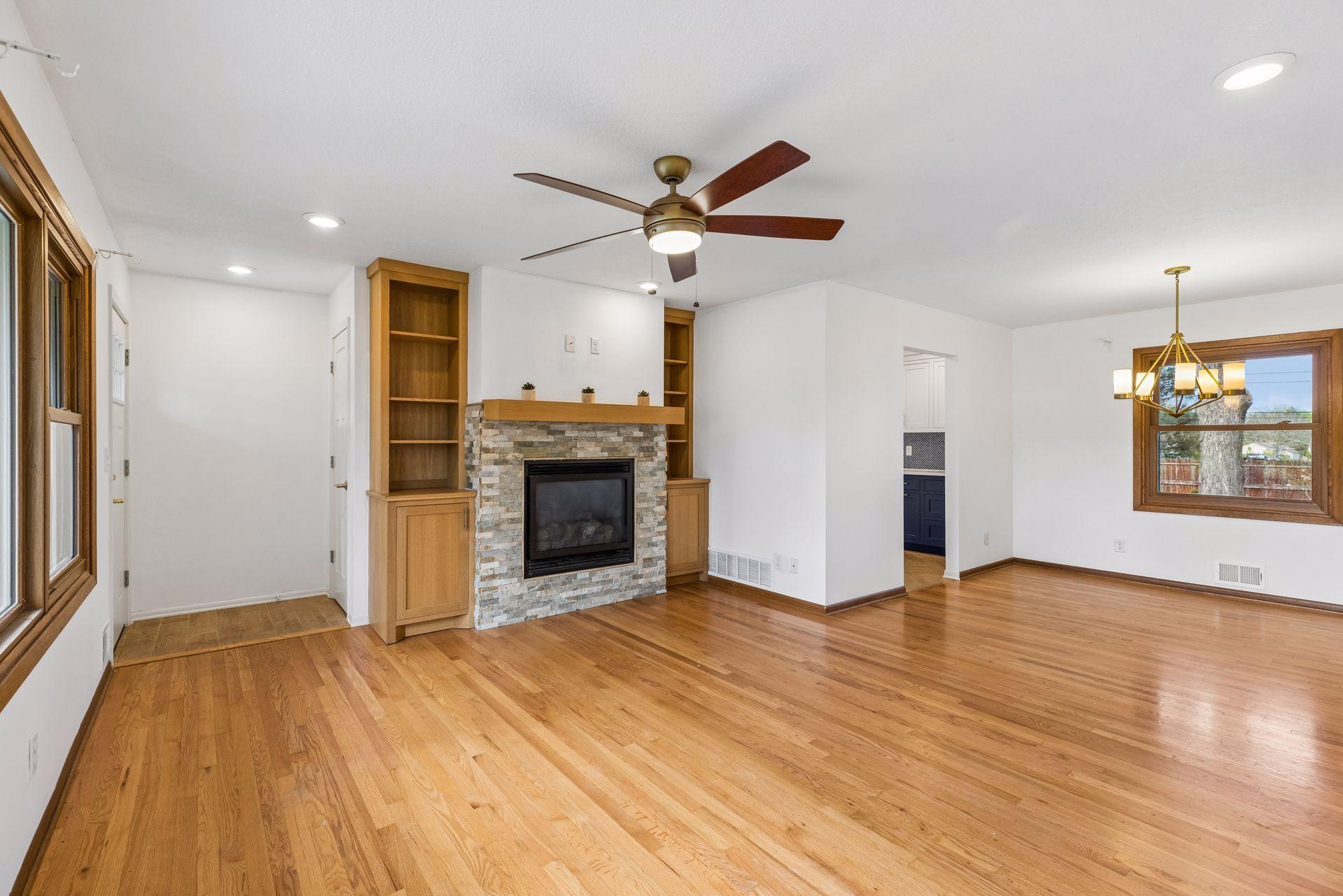 The focal point here is the gas fireplace and built in shelves.