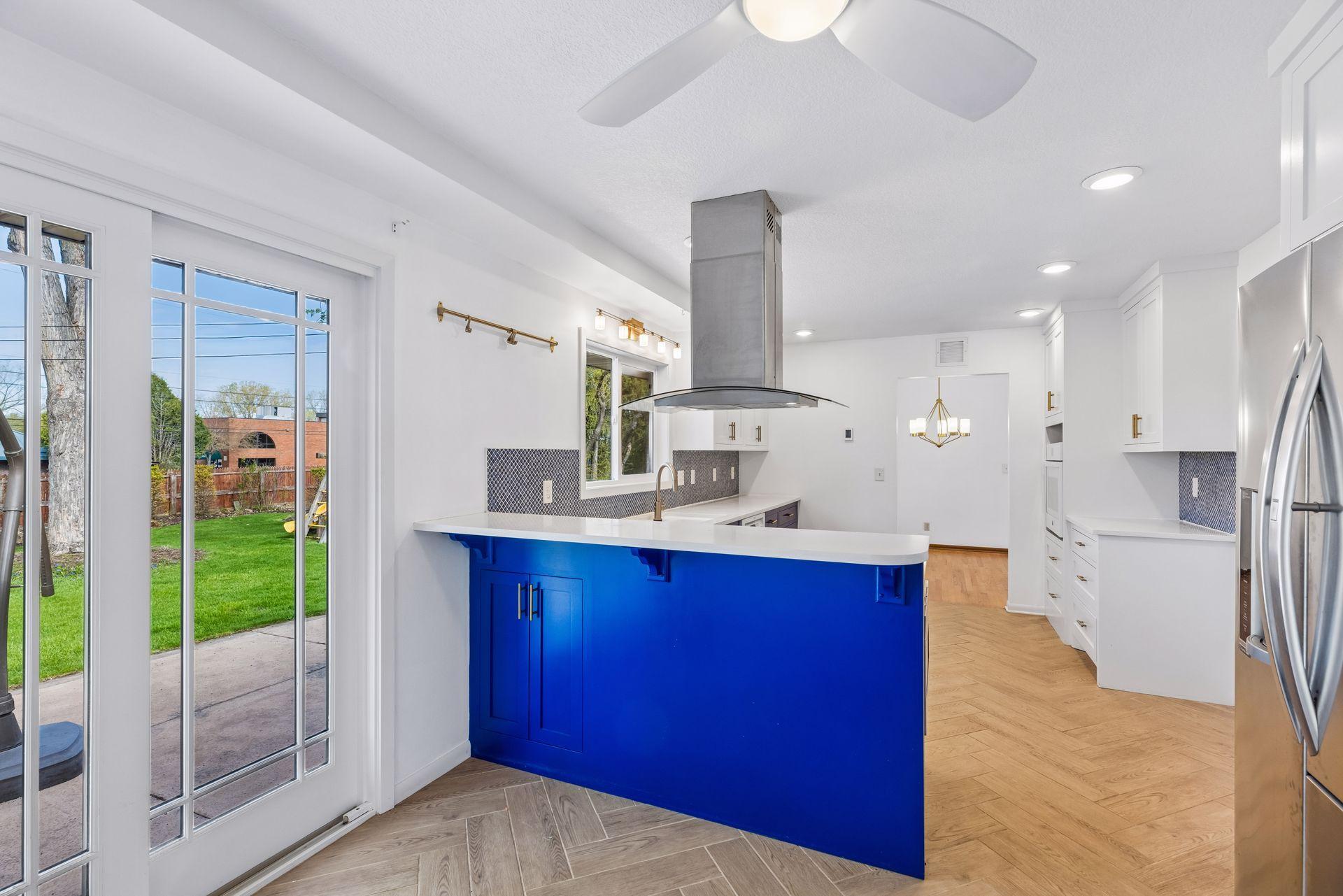 The kitchen herringbone pattern tile floors.