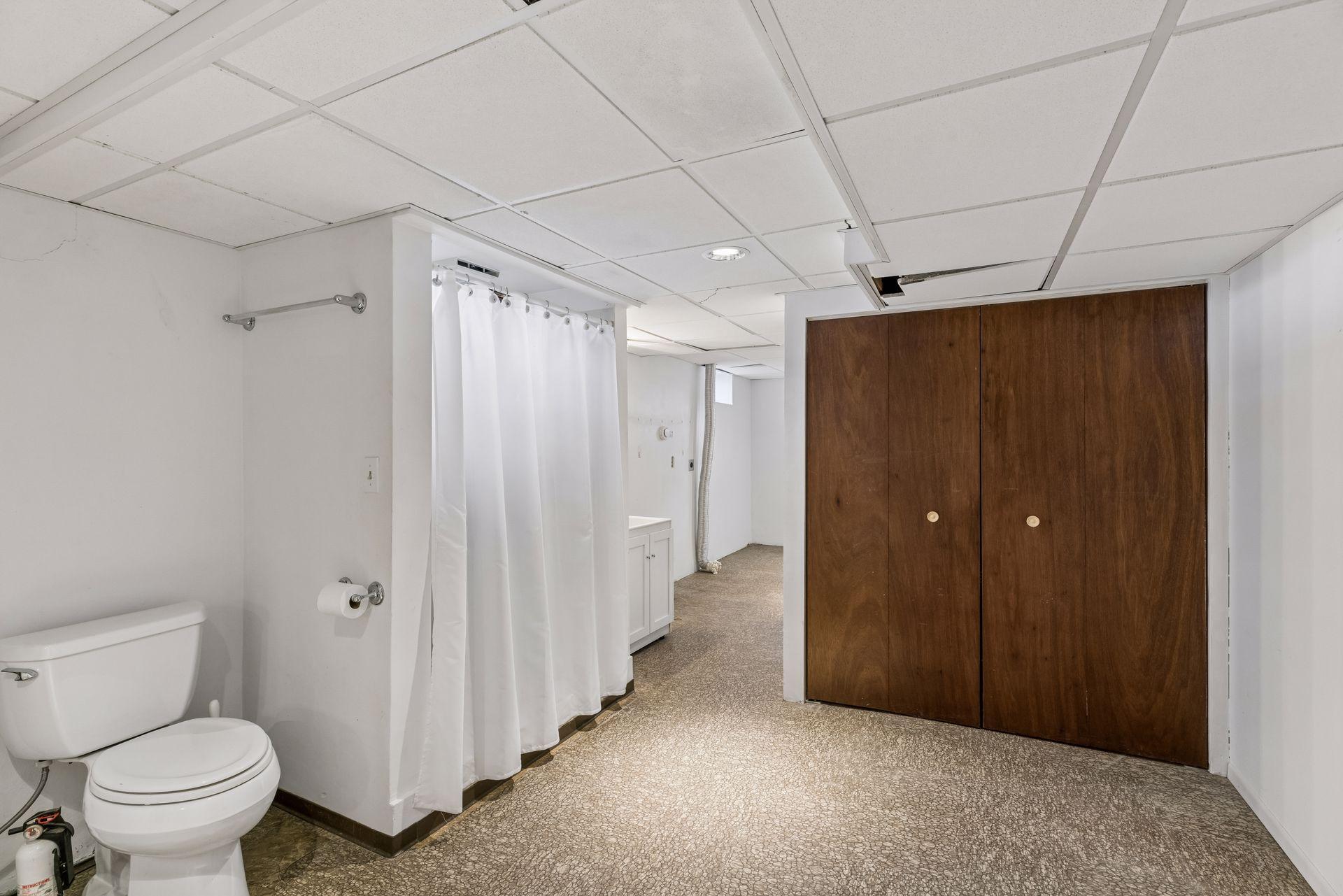 The third bedroom is located downstairs.
