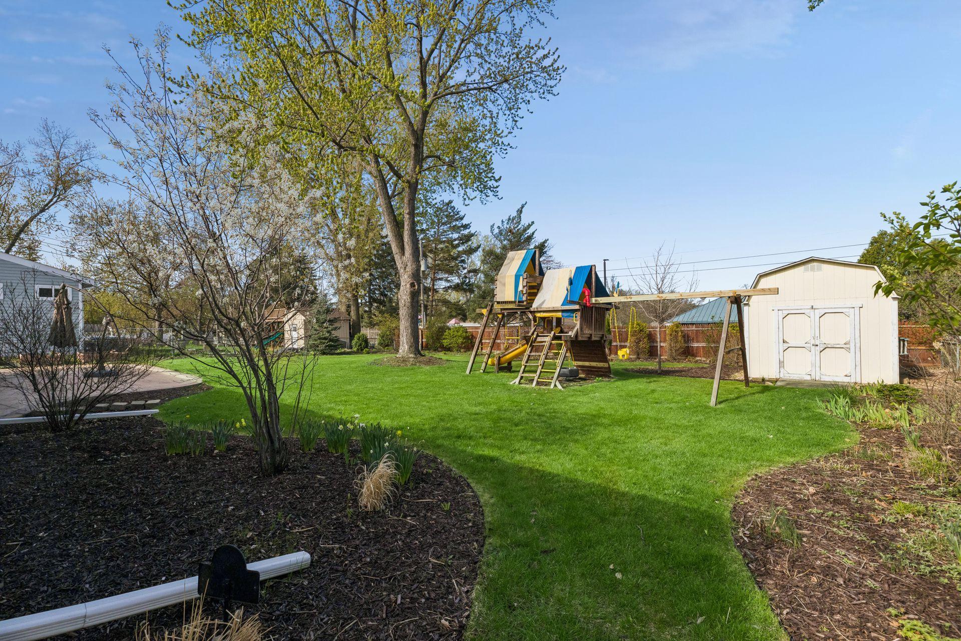 The yard was professionally landscaped by Bachmans and is simply stunning.
