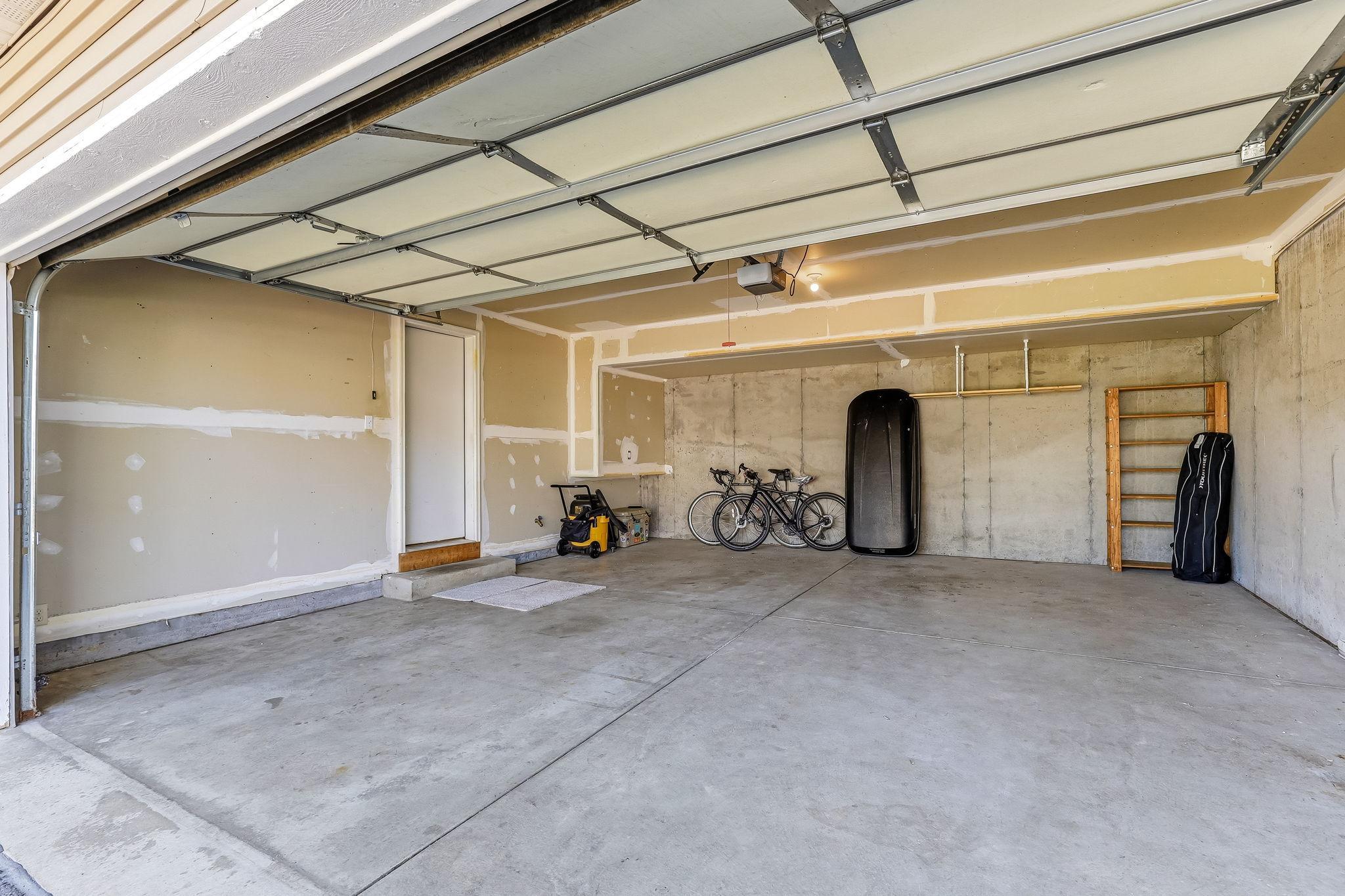 1505 Senate Lane - Oversized garage has room for two vehicles, garbage and recycling bins, and additional storage