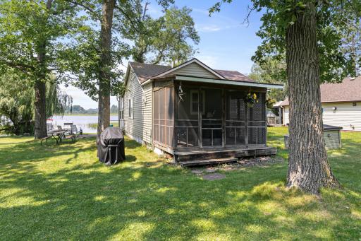 Enjoy the outdoors while still being protected by the bugs in the screened in porch.