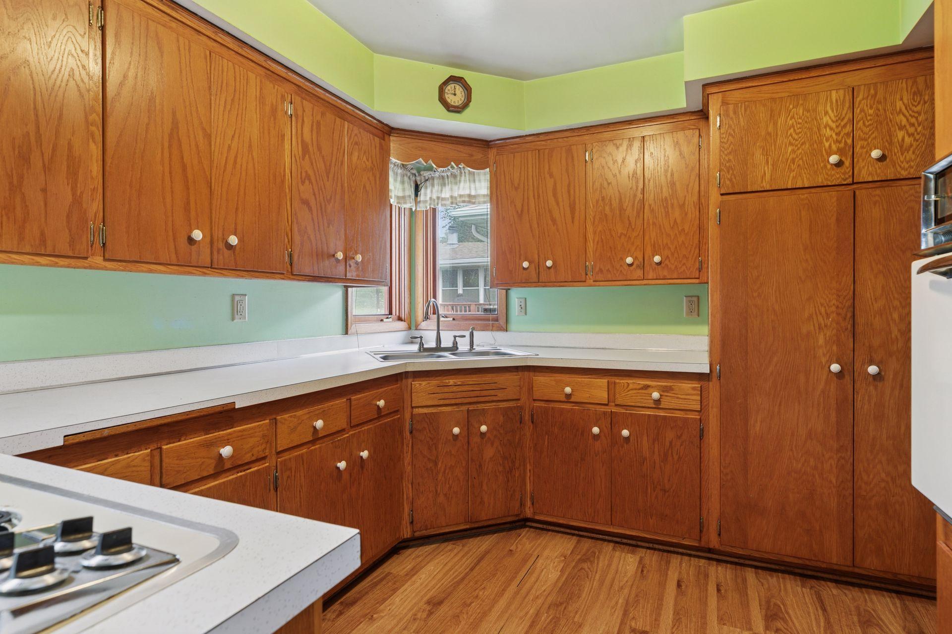 Corner window over sink with view to backyard!