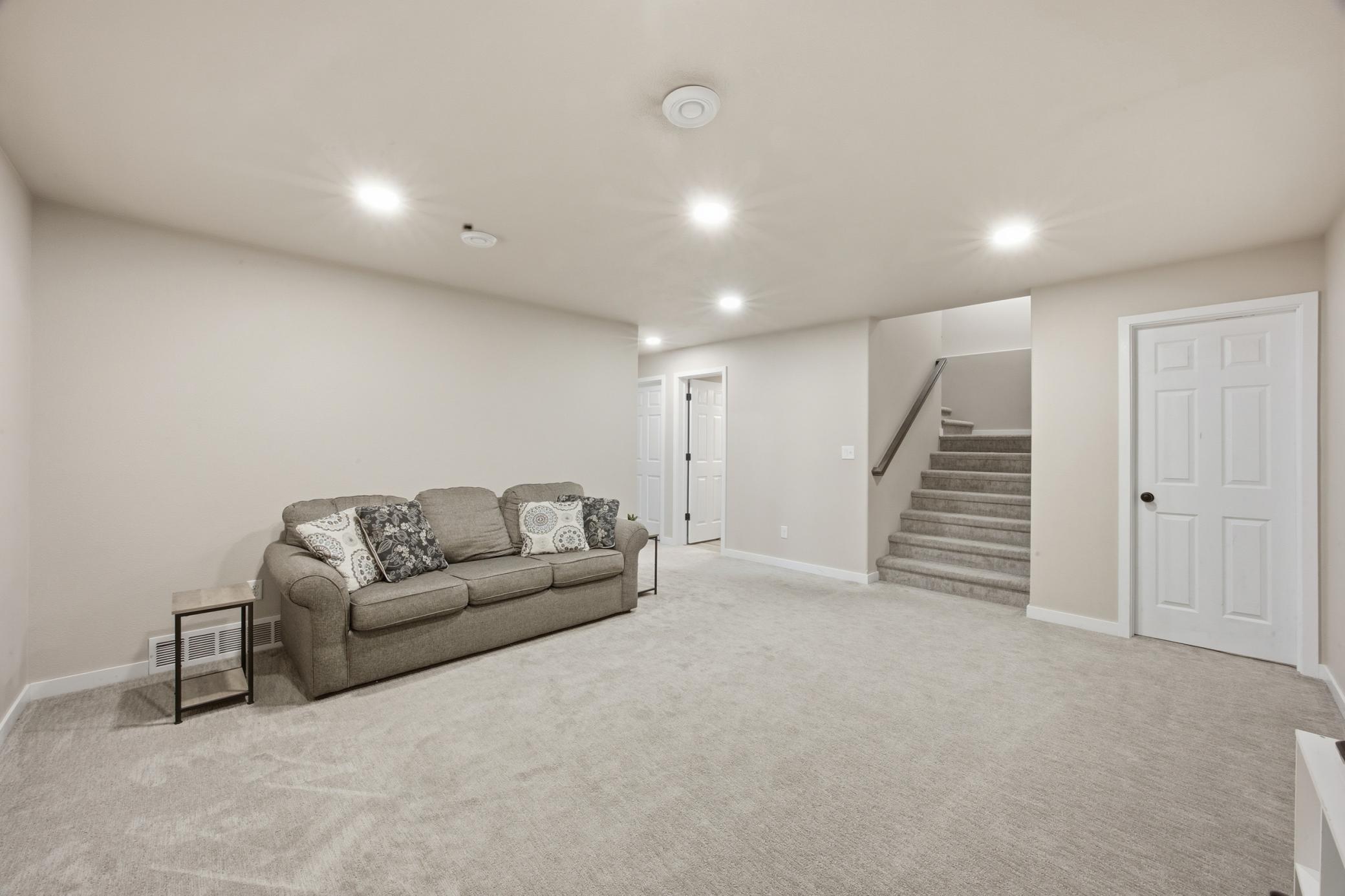 BSMT family Room; BSMT floor plan was extended extra 2' depth!