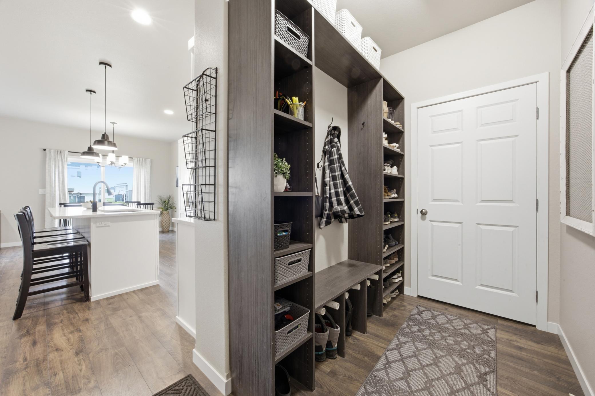 Mudroom w/boot dryers + access to pantry closet!