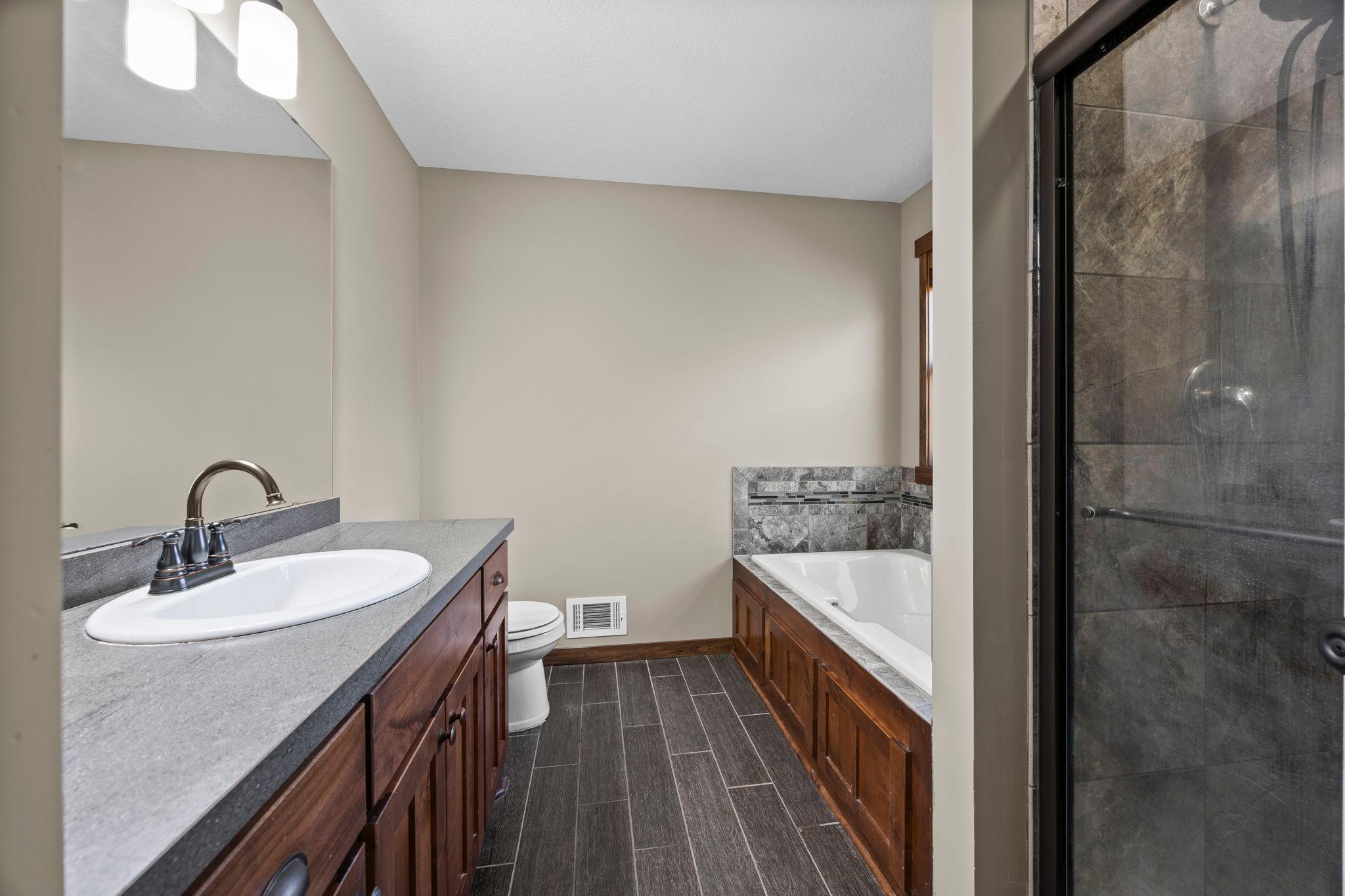 Primary bath with separate tub and shower