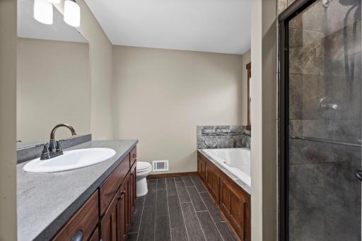 Primary bath with separate tub and shower