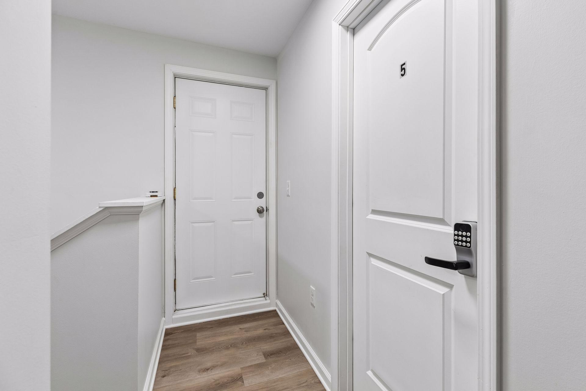 3rd level with rooftop deck and Bedroom 5