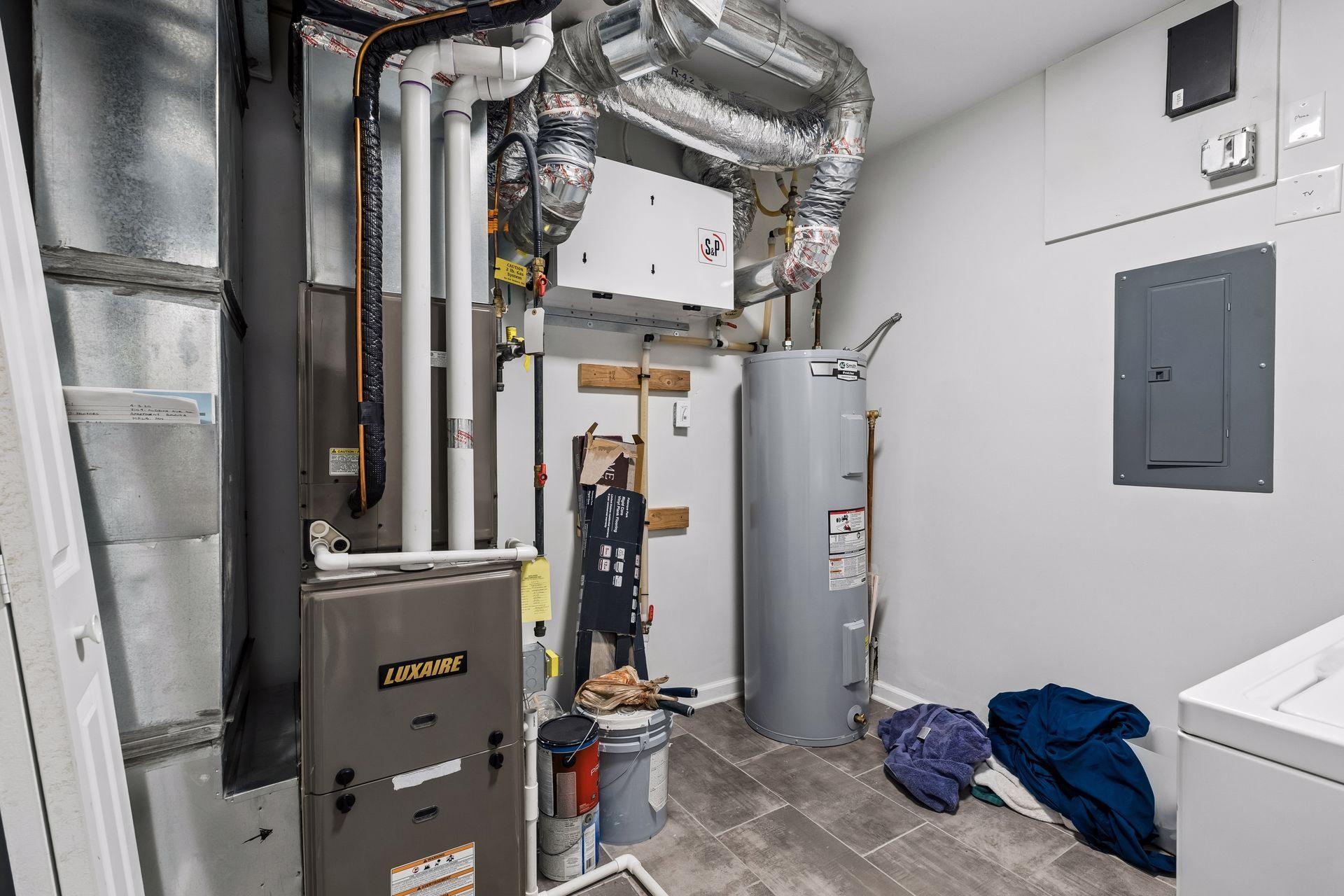 Separate mechanical room and laundry in lower level