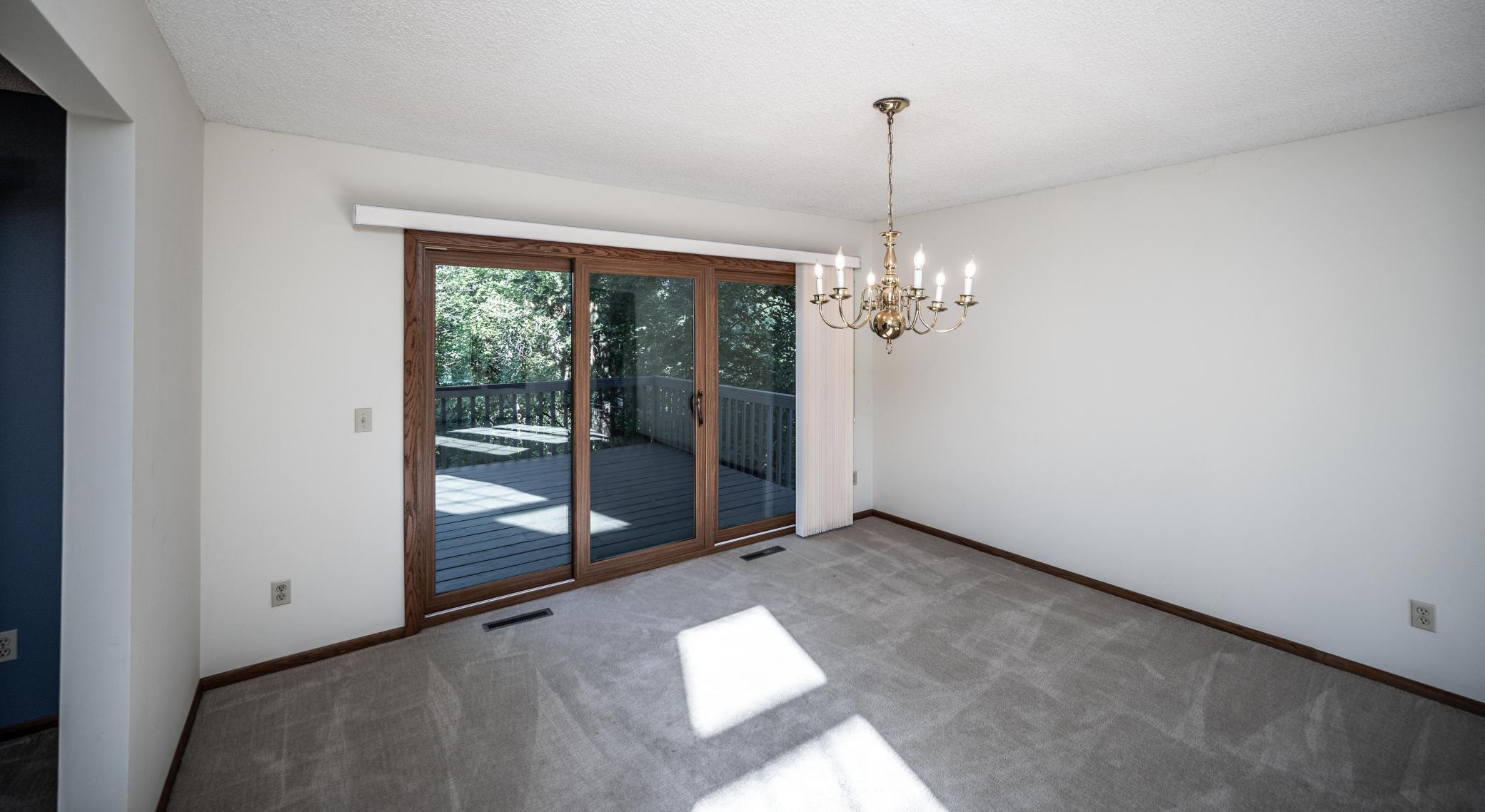 Formal dining room with access to the deck