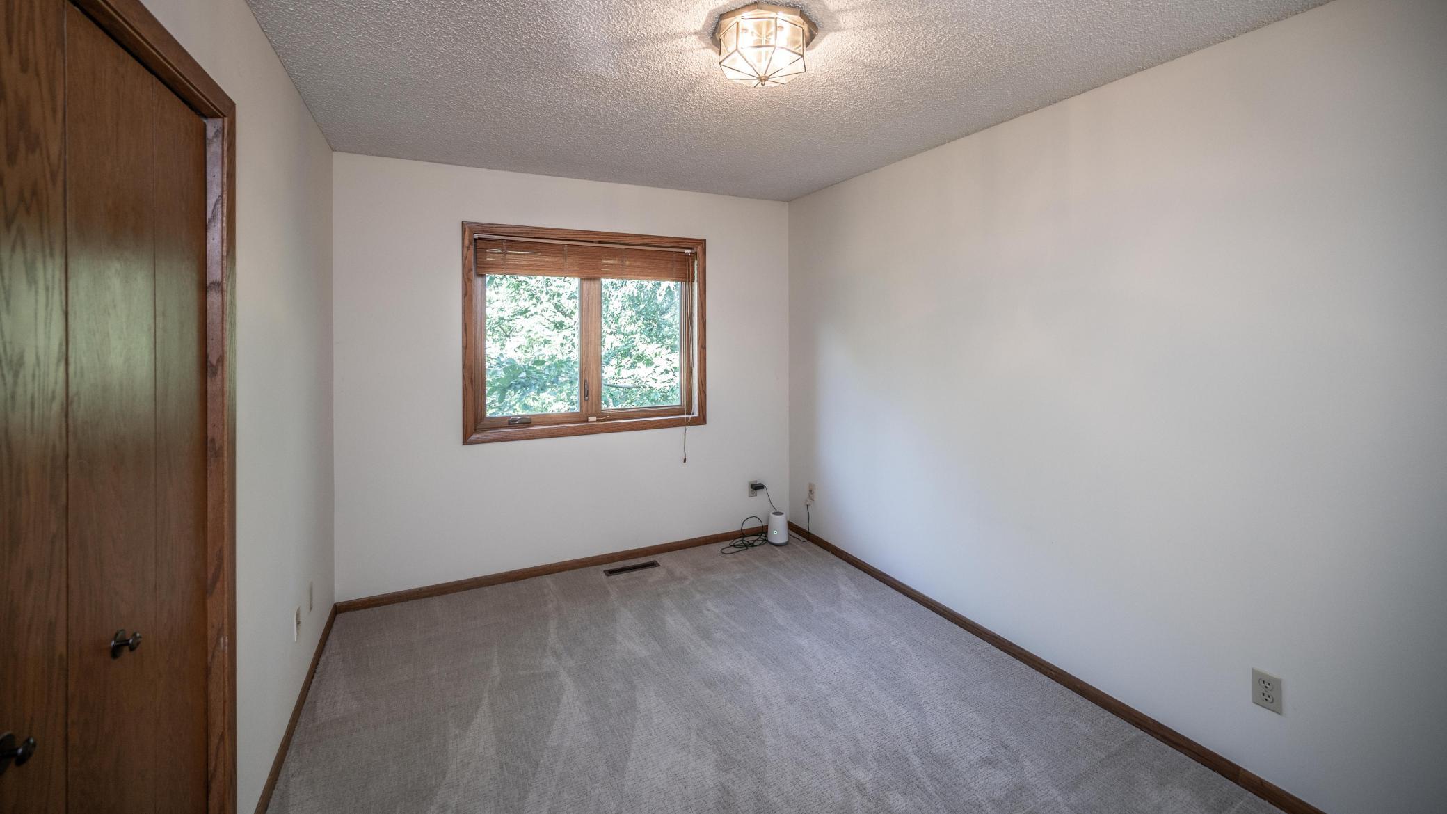 Bedroom #2 on the upper level also has newer carpet