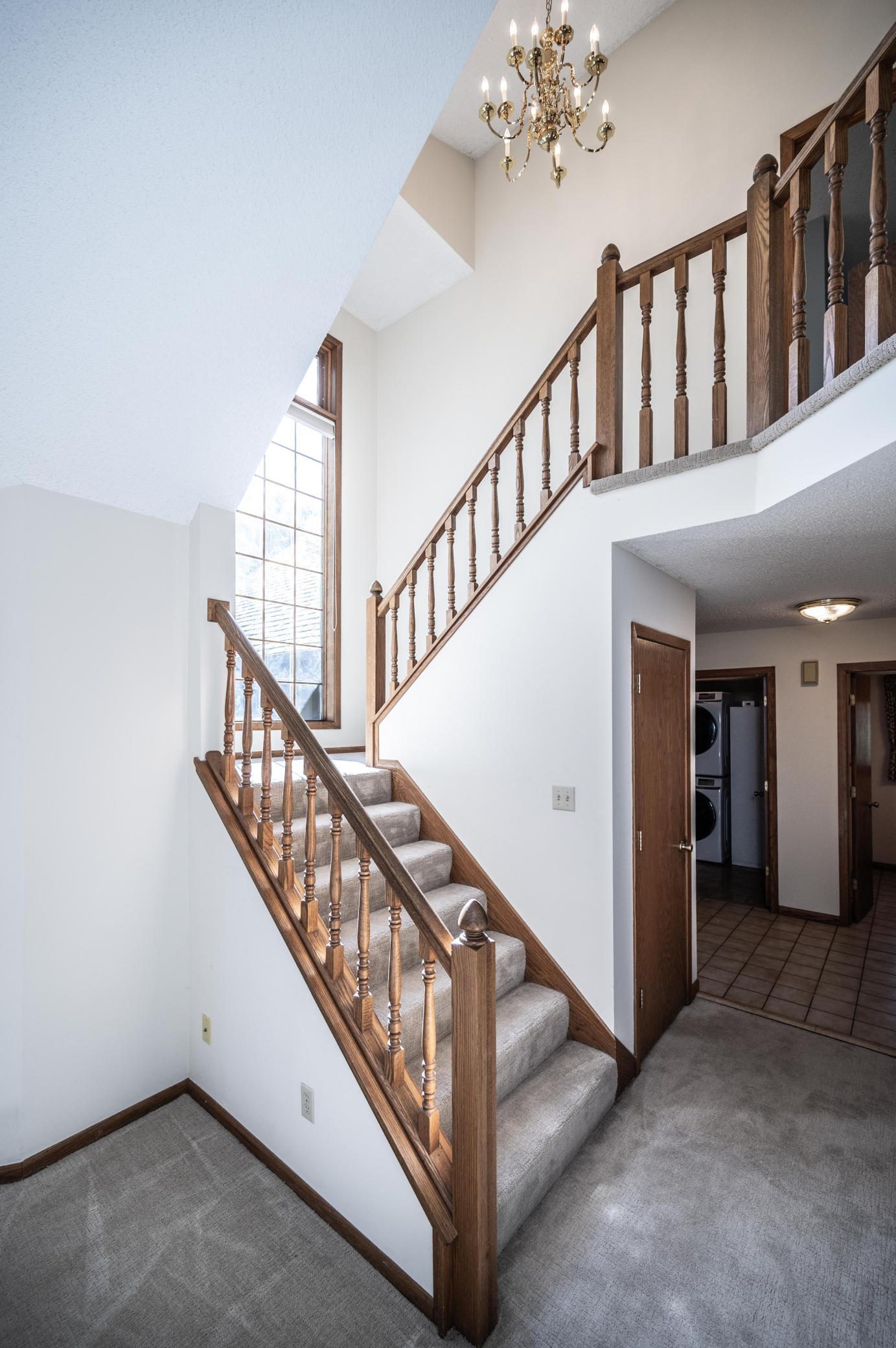 Stairs to the upper level have been recently carpeted