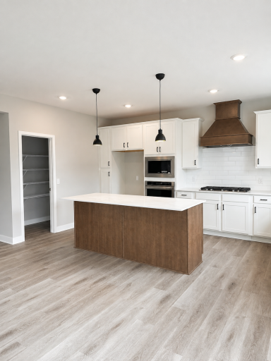 Welcome home to 917 Foxglove Terrace! This home features our Gourmet kitchen and a massive walk-in pantry!