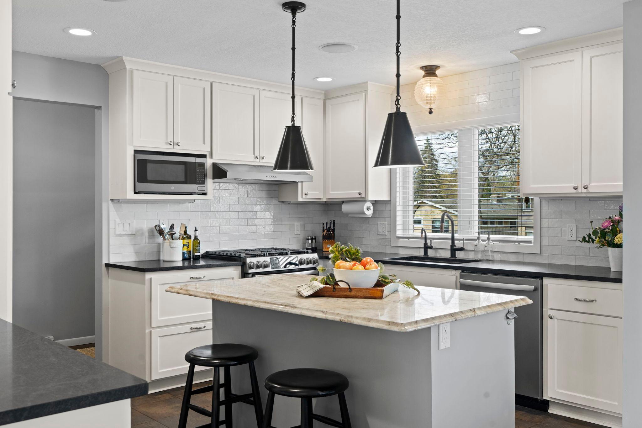 Fabulous kitchen island and window creates a open, bright floor plan.