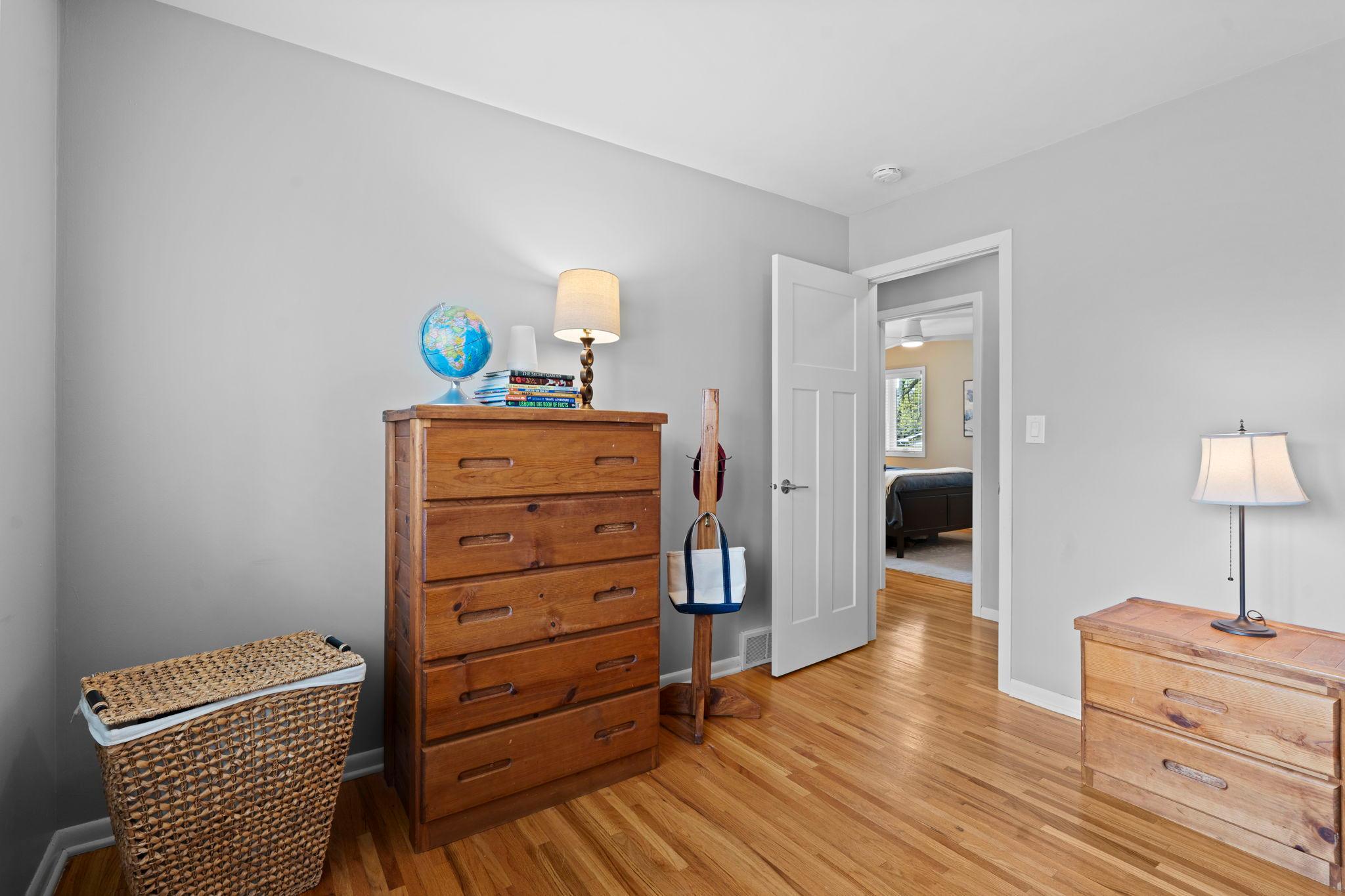 Refinished hardwood floors and Craftsmans style doors.